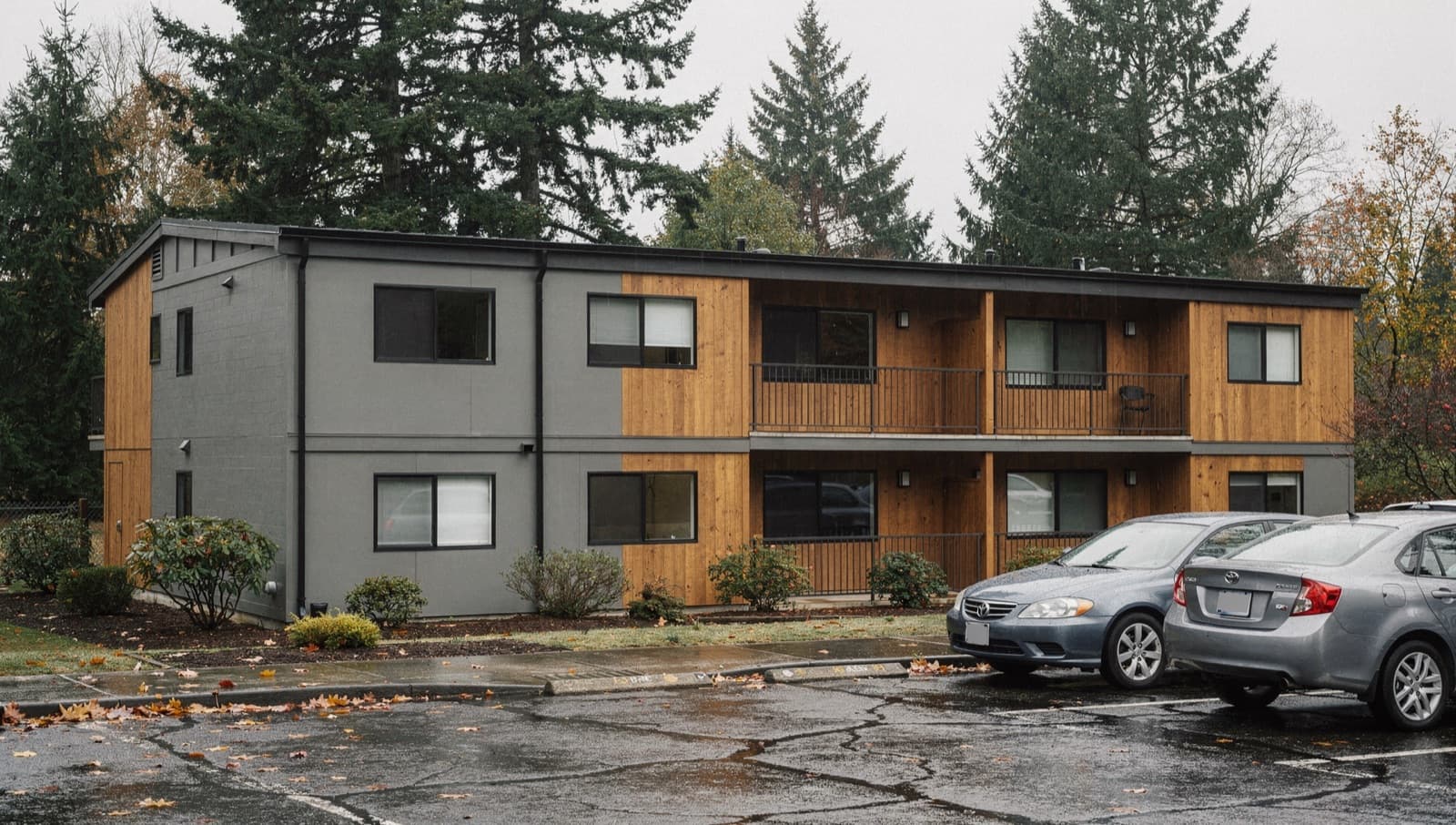 Exterior of a Pacific Northwest apartment building on an overcast day